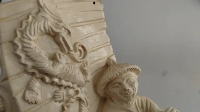 SUJETA LIBROS ASIÁTICO