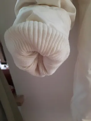 Piumino lungo beige con cappuccio