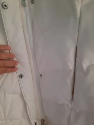 Piumino lungo beige con cappuccio