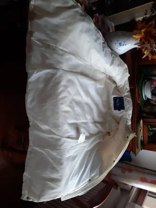 Piumino lungo beige con cappuccio