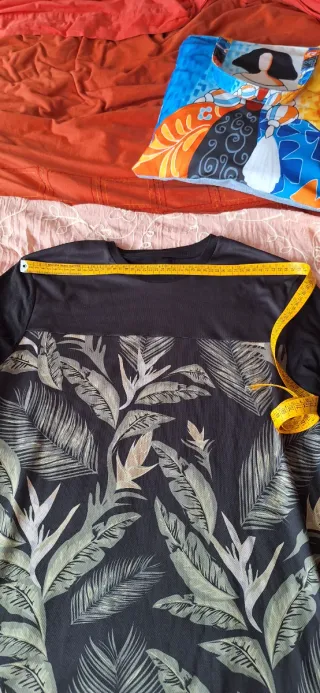 Vestido camiseta larga ASOS T. L. XL.