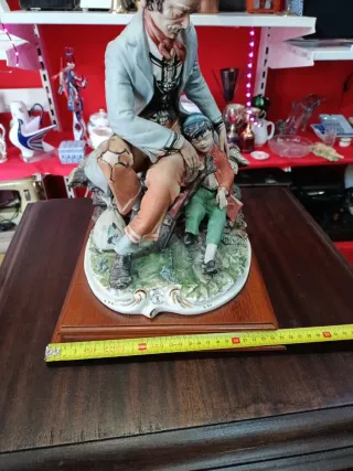 Figura Capodimonte vagabundo con niño