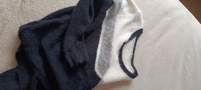 Jersey de punto negro, blanco y plateado