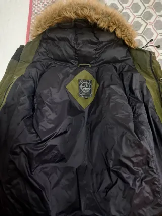 Abrigo de plumas verde invierno