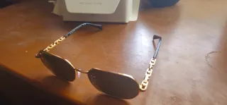 Gafas de sol Michael Kors doradas y negras