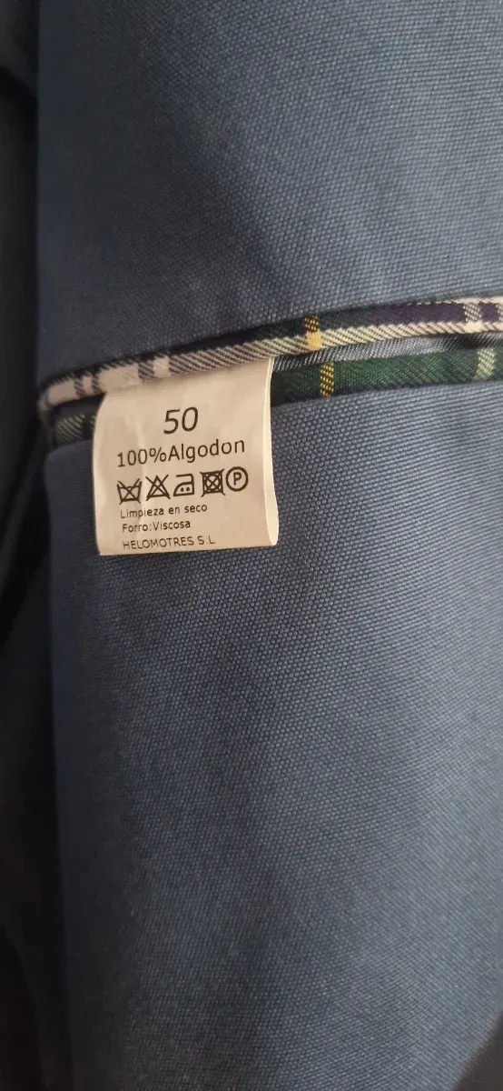 Americana azul con coderas