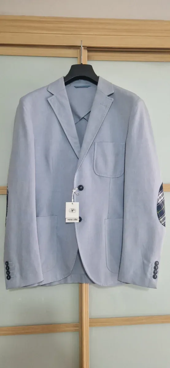 Americana azul claro con coderas