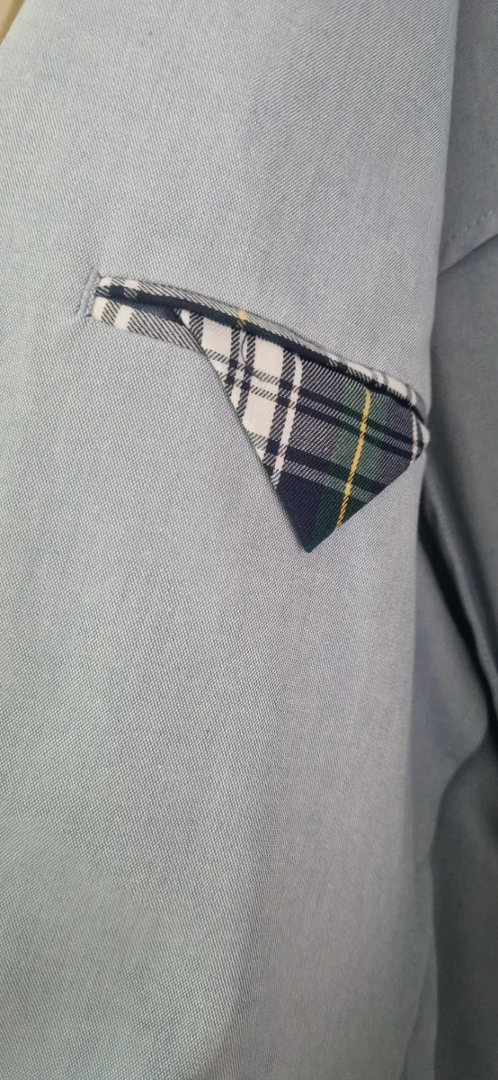 Americana azul claro con coderas