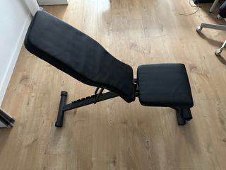 Set de discos, barras y banco de musculación