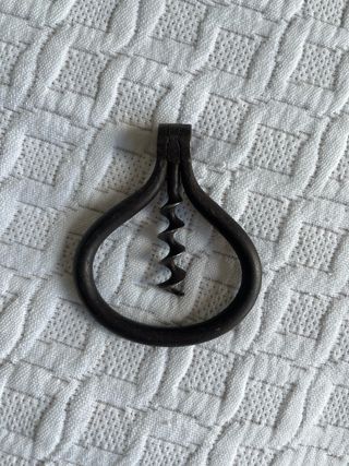 Antico cavatappi in metallo