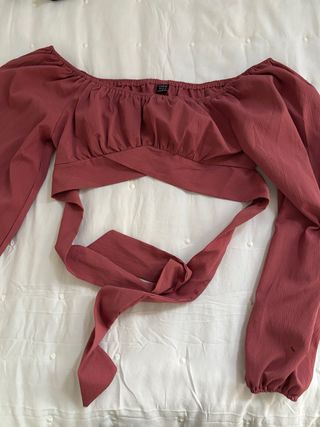 Blusa rosa manga larga cruzada