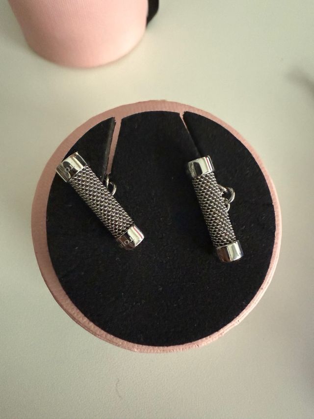 Gemelos TOUS plateados.