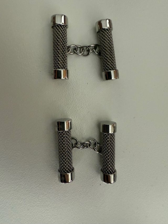 Gemelos TOUS plateados.