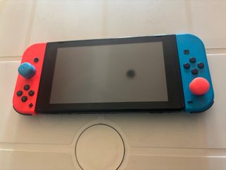 Nintendo Switch V1 – Completa+ Joypad + Custodia