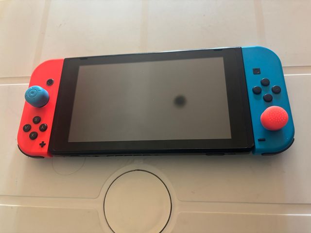 Nintendo Switch V1 – Completa+ Joypad + Custodia