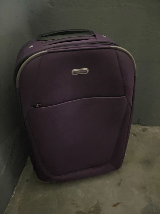 Maleta de viaje morada