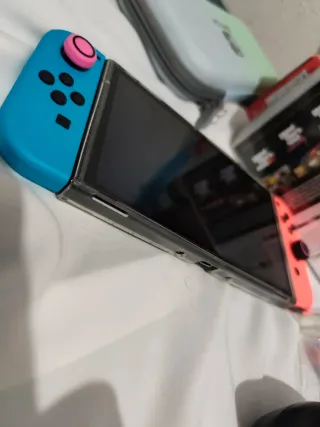 Nintendo Switch OLED Blu/Rosa + Giochi