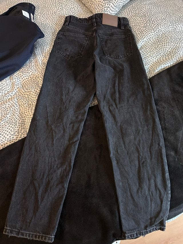 Tejano Slim talla 32 no pitillo. color negro ceniz