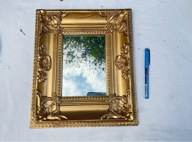 Specchio decorativo dorato