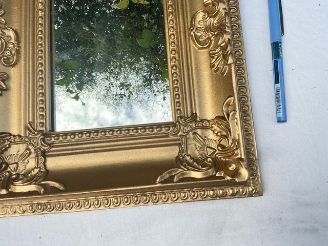 Specchio decorativo dorato