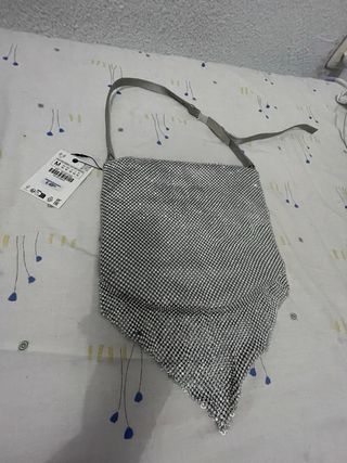 Bolso de fiesta plateado con pedrería