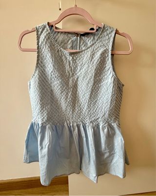 Blusa de Sfera, sin mangas, en azul