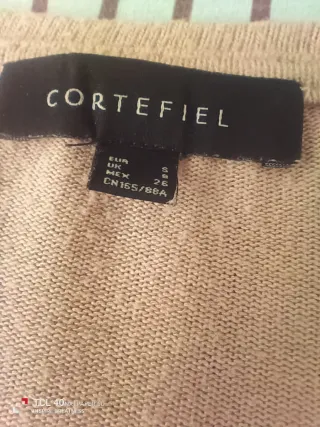 Jersey lana beige cuello pico