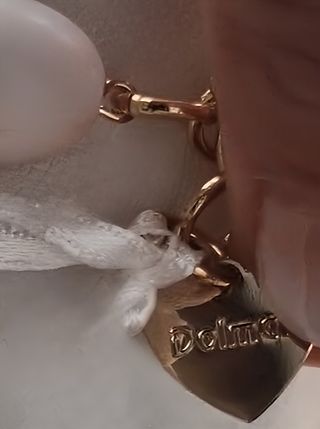 Collana Dolman multistrato perle con cartellino