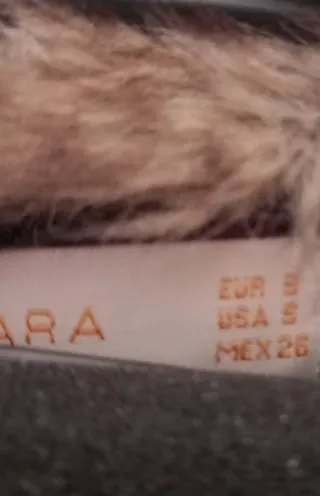 Chaqueta manga corta marrón con cuello de pelo