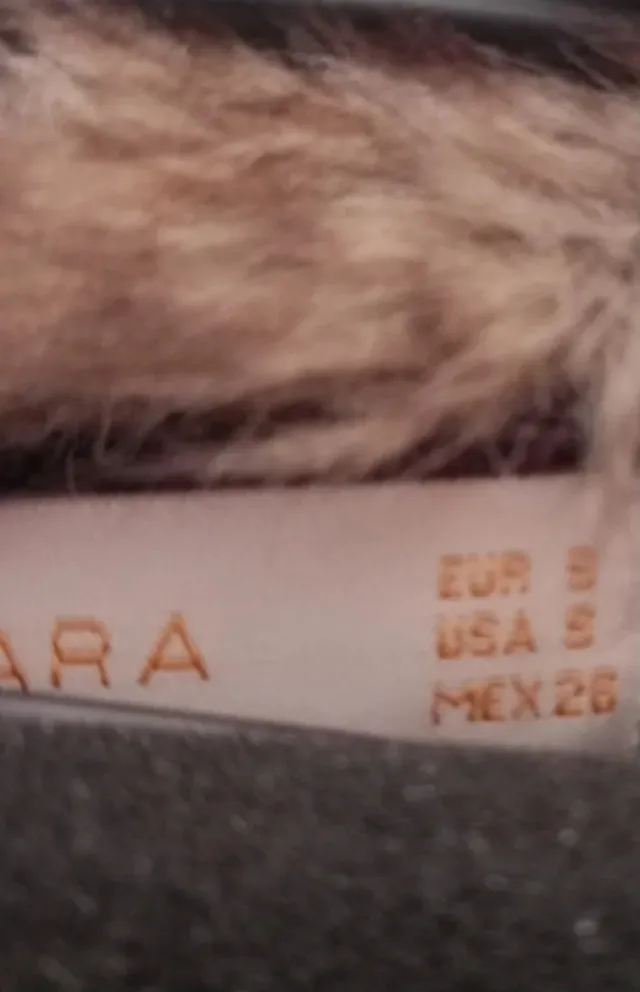 Chaqueta manga corta marrón con cuello de pelo