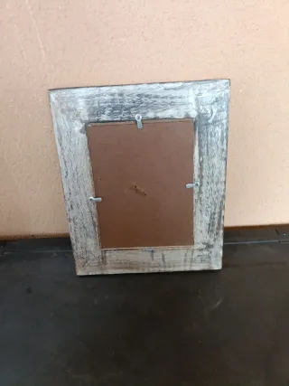 Marco de fotos antiguo de madera tallada