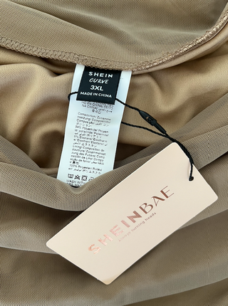 Falda lápiz midi de malla beige