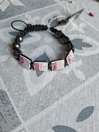 Pulsera con brillos rosa y plateados
