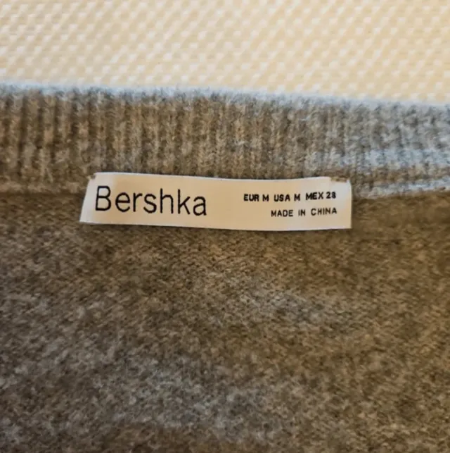 Jersey top de lana cuello pico gris