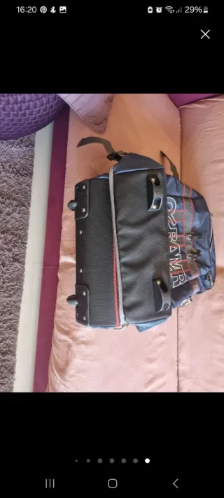 Maleta de viaje azul y gris