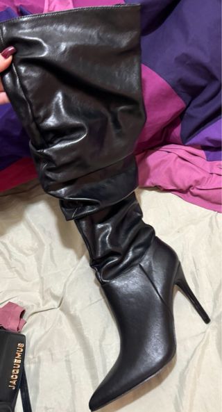 Stivali alti in pelle nera