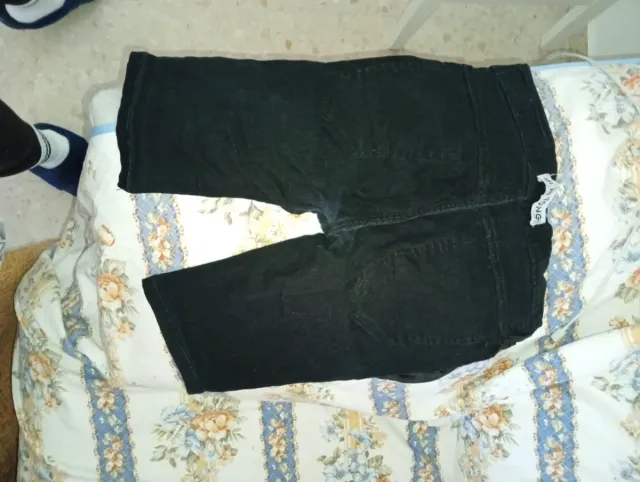 Pantalón vaquero rajado negro