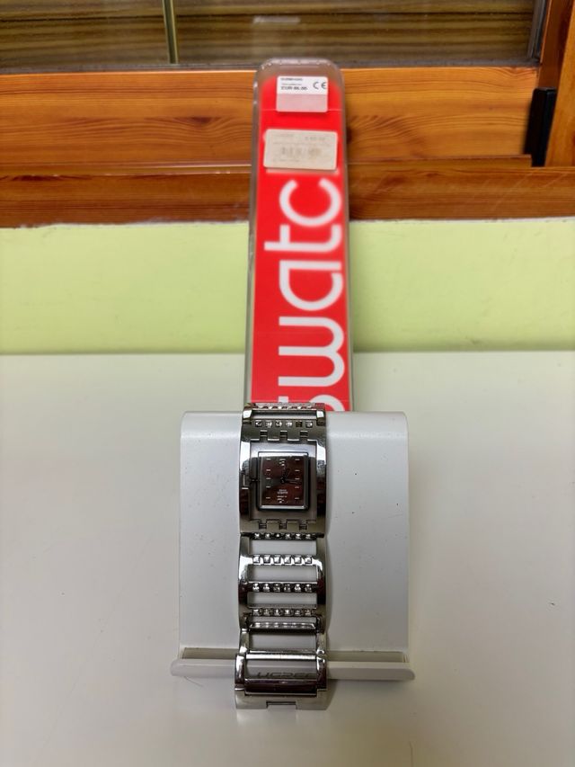 Reloj Swatch SUBM103G metálico con caja original