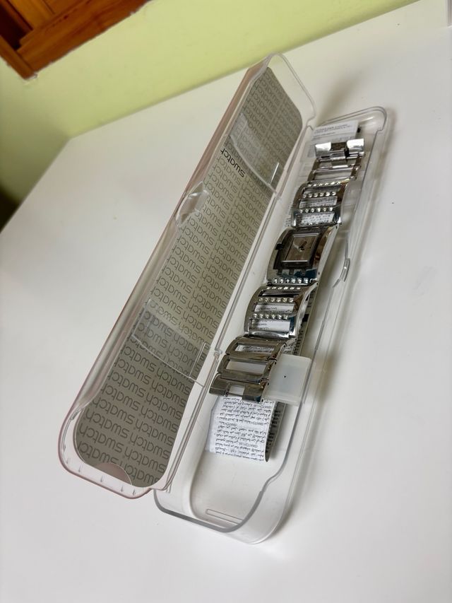 Reloj Swatch SUBM103G metálico con caja original