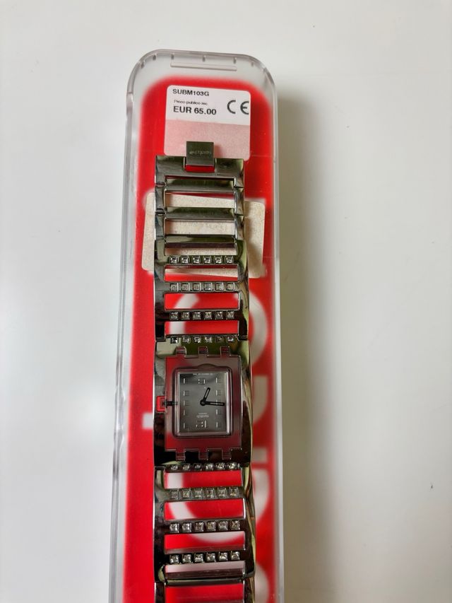Reloj Swatch SUBM103G metálico con caja original