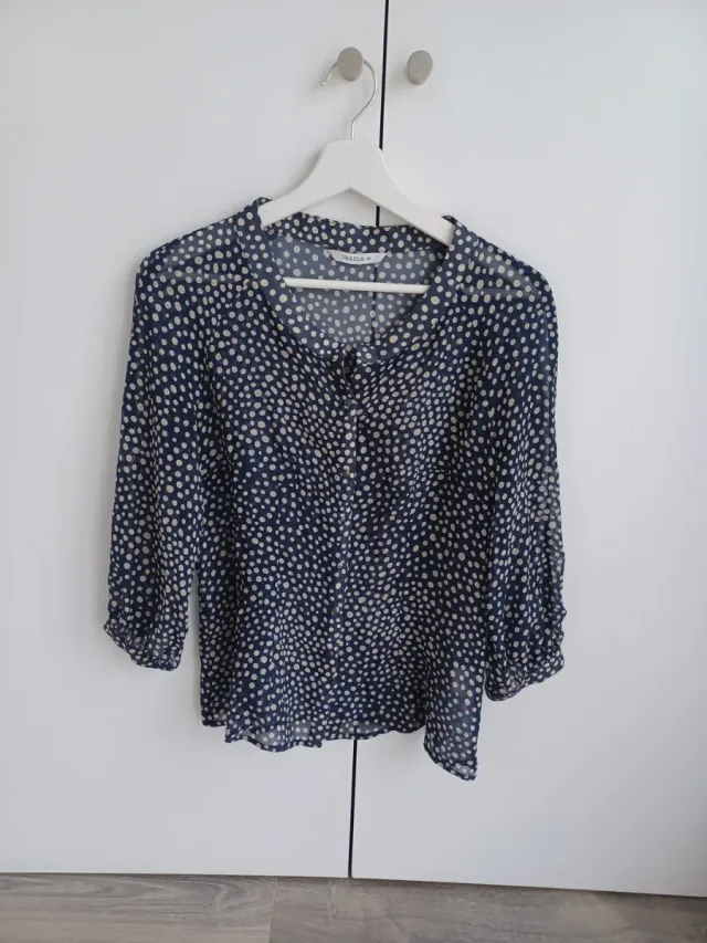 Blusa de seda estampada