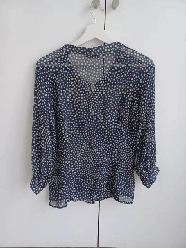 Blusa de seda estampada