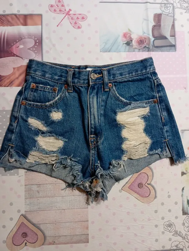 Shorts di jeans strappati bambina 9-10 anni