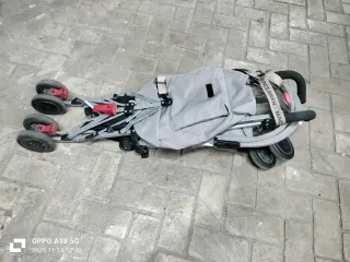 Silla de paseo McLaren rosa y gris