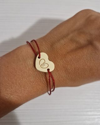 BrBracciale cuore con filo regolabile nuovoacciale
