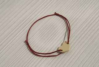 BrBracciale cuore con filo regolabile nuovoacciale