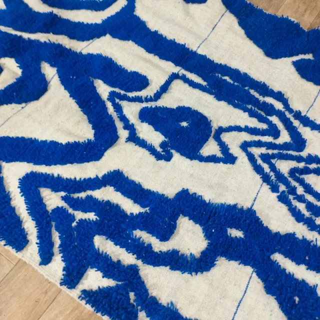 Alfombra de lana beige y azul