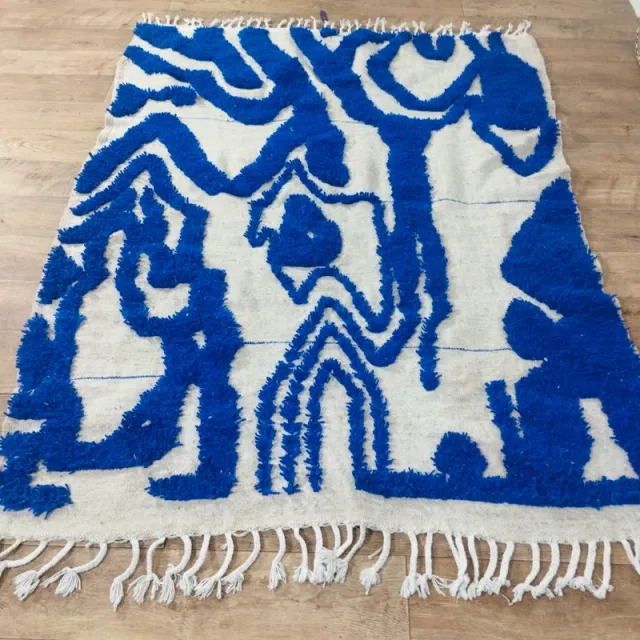 Alfombra de lana beige y azul