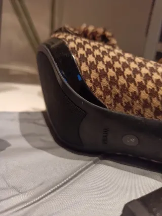 Stivali Prada eleganti con tacco e design a fiocco