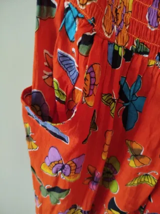 Pantalón gomillas. naranja estampado mariposas